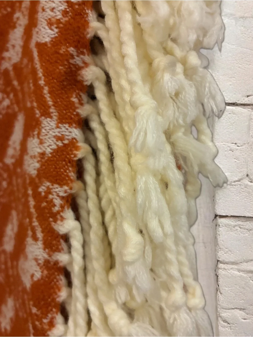 Threshold soft woven throw with knotted tassels. 60”x50”.